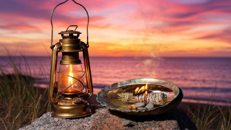 Lantern and Sage on Shore